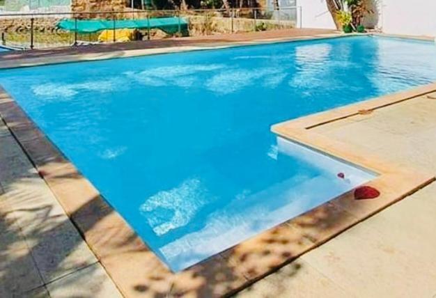 Pinnacle Holiday Homes อาร์โปรา ภายนอก รูปภาพ